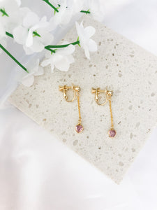 gold dangle screwback clip-on earrings with pink heart charm