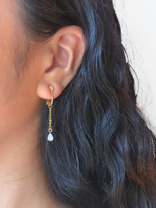 white teardrop dangle screwback clipon earrings on model
