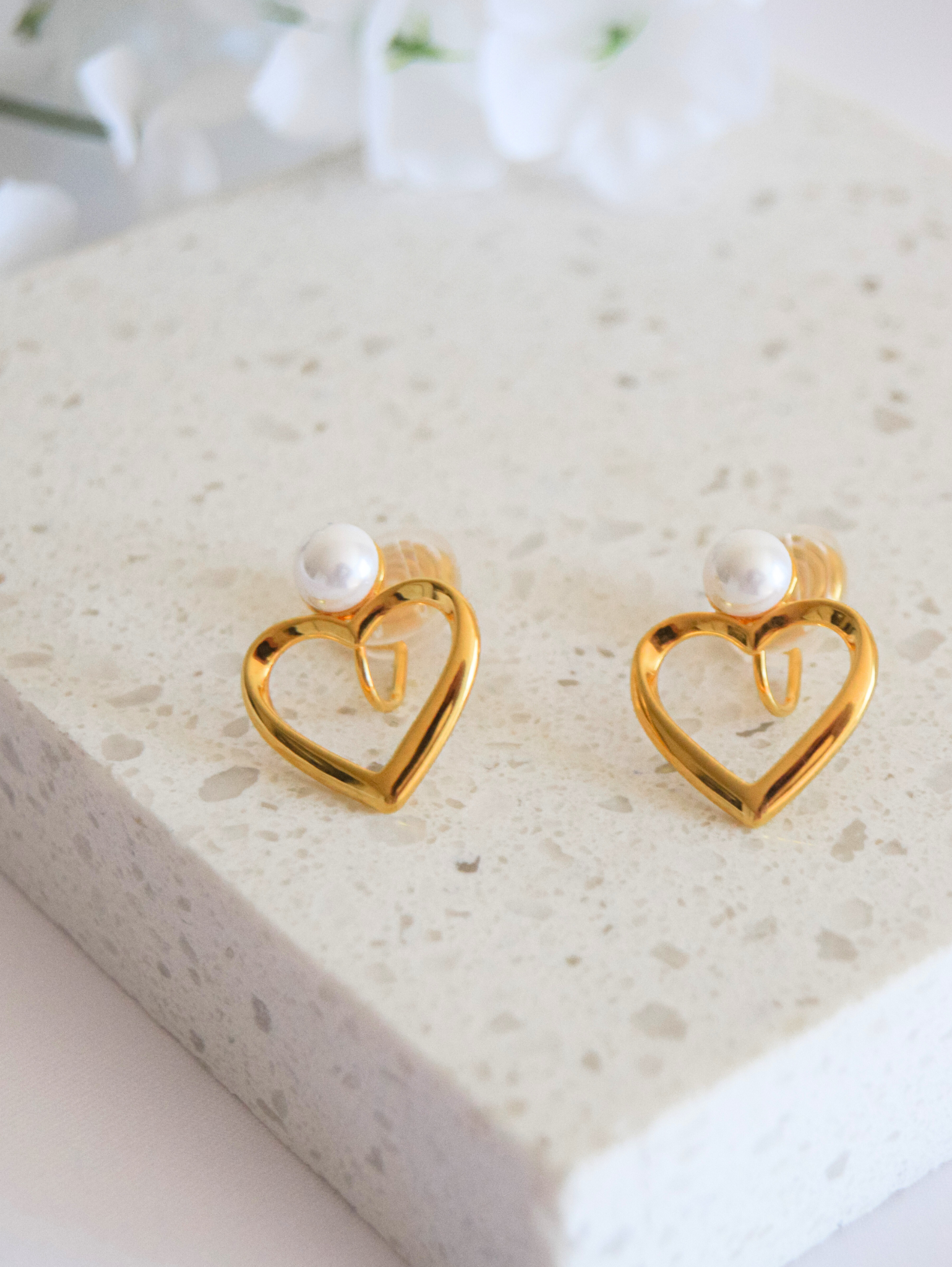 Heart clip best sale on earrings