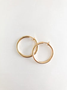 gold 1.25 width clip on hoops