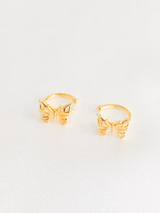 Upgrade your jewelry collection with our gold butterfly ear cuff, a unique and trendy accessory that adds a touch of whimsy to any outfit. The ear cuff features delicate butterfly wings with a shimmering gold-tone finish, measuring approximately 1 inch in length. The cuff is designed for comfortable and secure wear, even for those without pierced ears. 